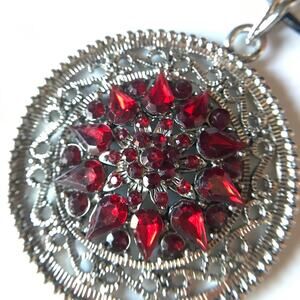Upcycled antiqued silver tone and ruby red rhinestone pendant necklace